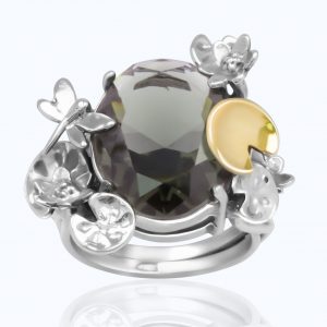 Ring aus 925 Silber mit 9 Karat Goldeinsätze und Höhenqualität synthetischer Turmalin